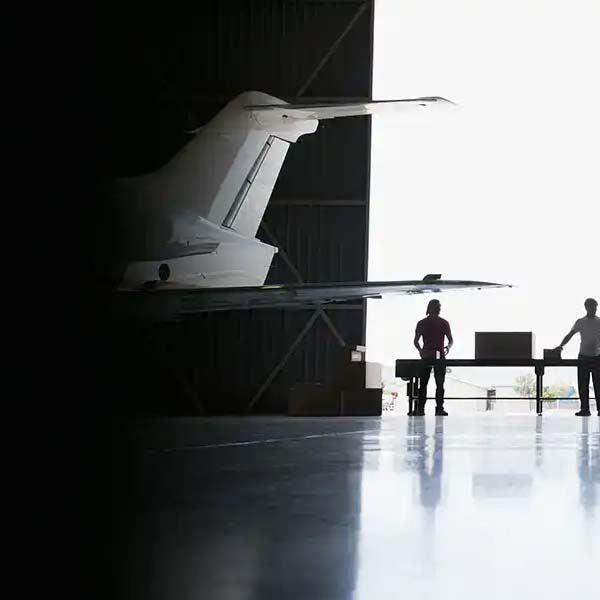 Plane in hanger international shipping