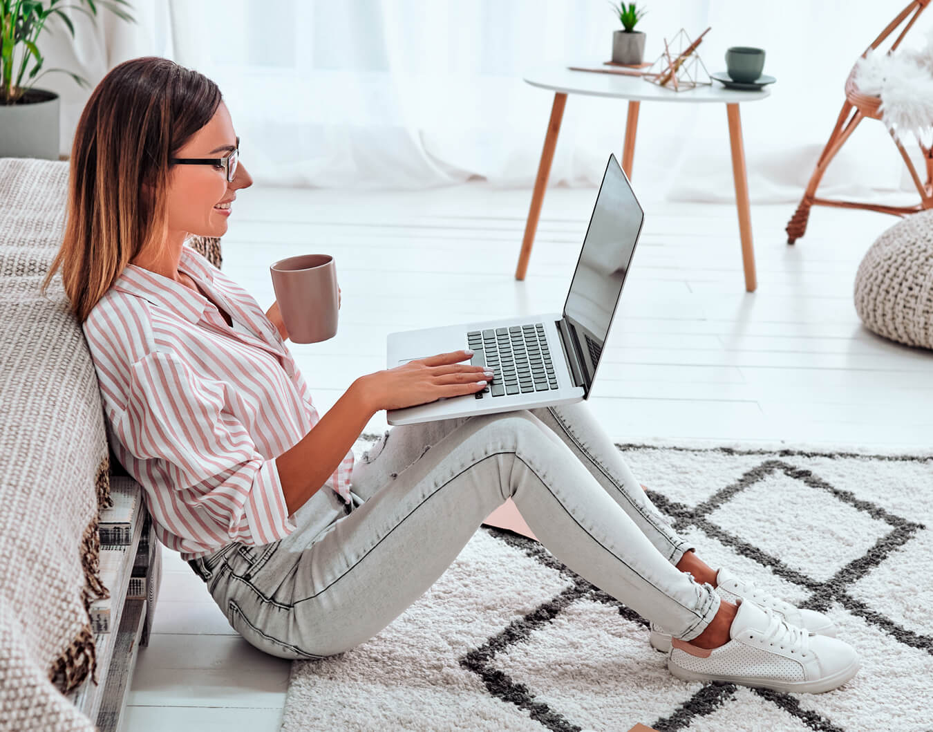 Woman checking order status on laptop