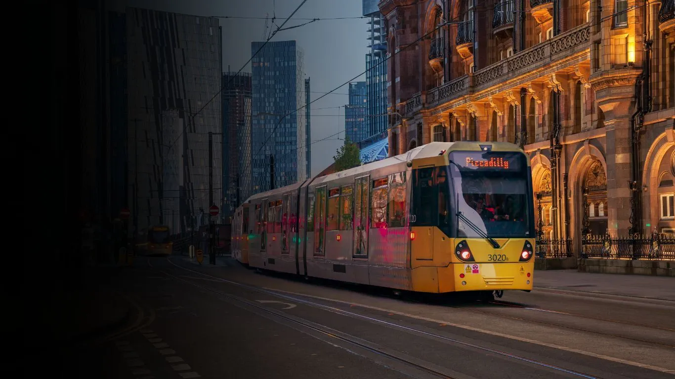 Tram running through Manchester City centre